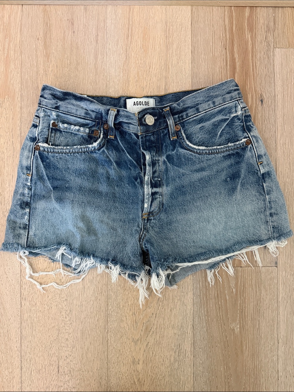 AGOLDE Parker Shorts: Light Blue Distressed Denim Cutoff Shorts